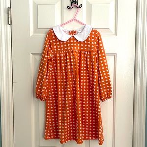 Stitchy Fish, size 6, orange and white polka dot; 95% cotton/5% spandex,